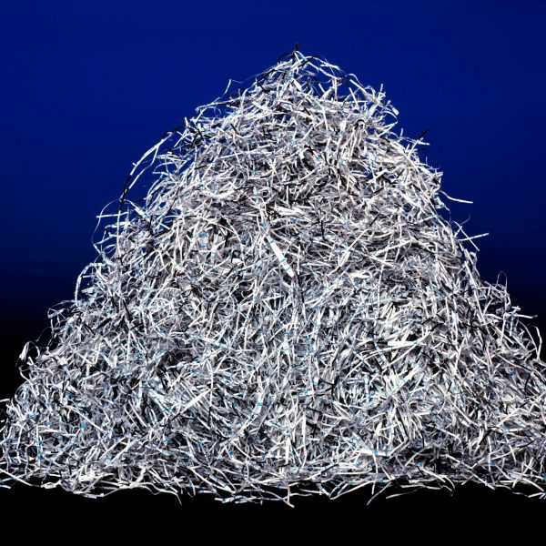 A large pile of shredded papers and documents